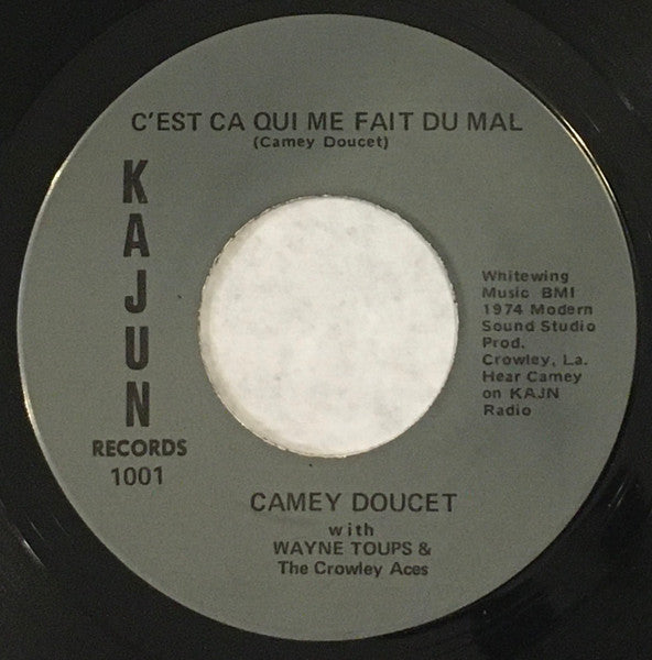 Camey Doucet With Wayne Toups And The Crowley Aces : C'est Ca Qui Me Fait Du Mal / Une Pomme Par Jour (7", Single)