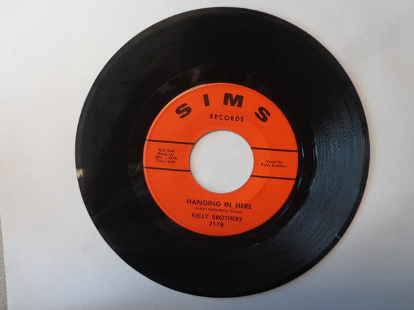 The Kelly Brothers : You Put Your Touch On Me / Hanging In Here (7", Single)