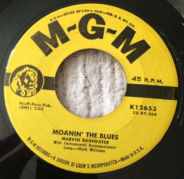 Marvin Rainwater : Moanin' The Blues / Gamblin' Man (7")