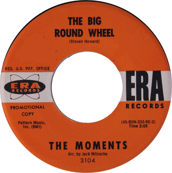 The Moments (2) : The Big Round Wheel (7", Single, Promo)