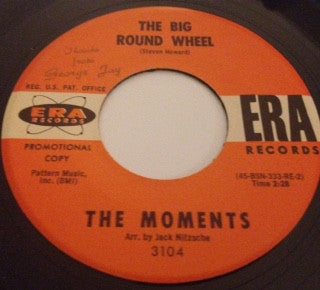 The Moments (2) : The Big Round Wheel (7", Single, Promo)